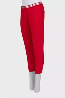 Cropped red trousers with arrows