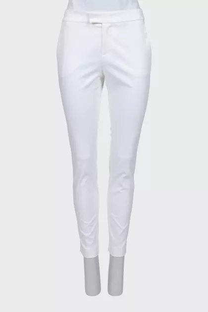 Tapered white trousers with arrows