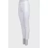 Tapered white trousers with arrows