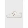 Leather sneakers with gold tongue