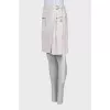 Skirt with patch pockets and tag