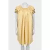 A-line dress with draping and tag