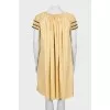 A-line dress with draping and tag