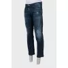 Men's straight-leg jeans with a distressed effect