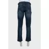 Men's straight-leg jeans with a distressed effect