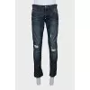 Men's blue jeans with distressed effect