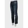 Men's blue jeans with distressed effect