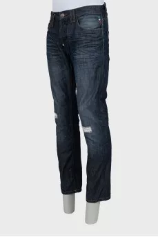 Men's blue jeans with distressed effect