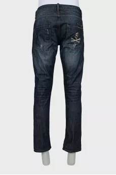 Men's blue jeans with distressed effect