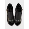 Ankle boots with golden zipper