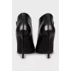 Ankle boots with golden zipper