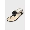 Leather sandals decorated with flowers