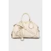 Leather bag with gold logo