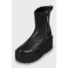 Chunky-soled boots with zippers
