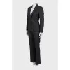 Striped suit with flared trousers