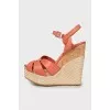 Leather sandals with woven wedge heel