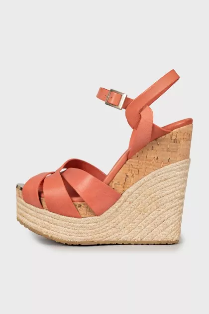 Leather sandals with woven wedge heel