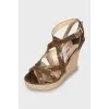 Leather sandals with woven wedge heel