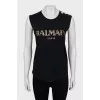 Tank with gold logo