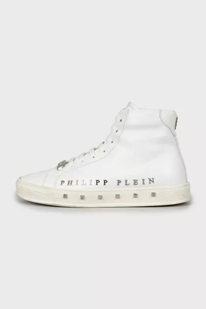 Leather sneakers decorated with studs