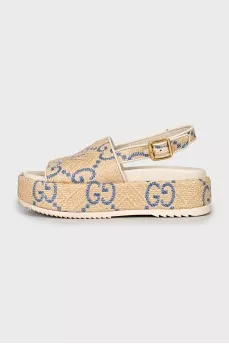 Woven sandals in signature print