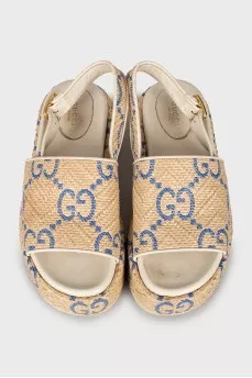 Woven sandals in signature print