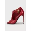 Red leather ankle boots