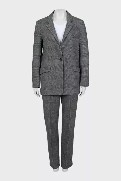 Suit with trousers in checkered print