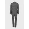 Suit with trousers in checkered print