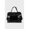 Embossed patent leather bag