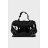 Embossed patent leather bag