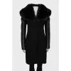 Coat with leather sleeves and fur