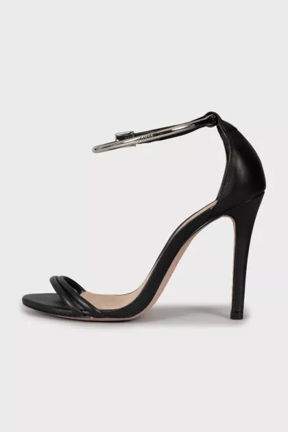 Leather sandals with metal bracelet
