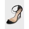 Leather sandals with metal bracelet
