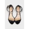 Leather sandals with metal bracelet