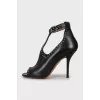 Black leather shoes with silver trim
