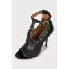 Black leather shoes with silver trim