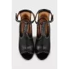Black leather shoes with silver trim
