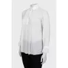 Sheer blouse with ruffled cuffs