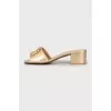 Gold sliders with signature logo