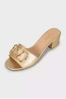 Gold sliders with signature logo