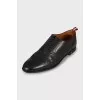 Leather brogues with decorative perforations