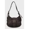 Leather shoulder bag with buckles