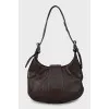 Leather shoulder bag with buckles