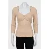 Fitted blouse with raised seams