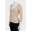 Fitted blouse with raised seams