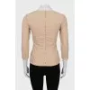 Fitted blouse with raised seams