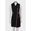 Dress with contrasting inserts and tag