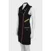 Dress with contrasting inserts and tag