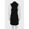 Dress with contrasting inserts and tag